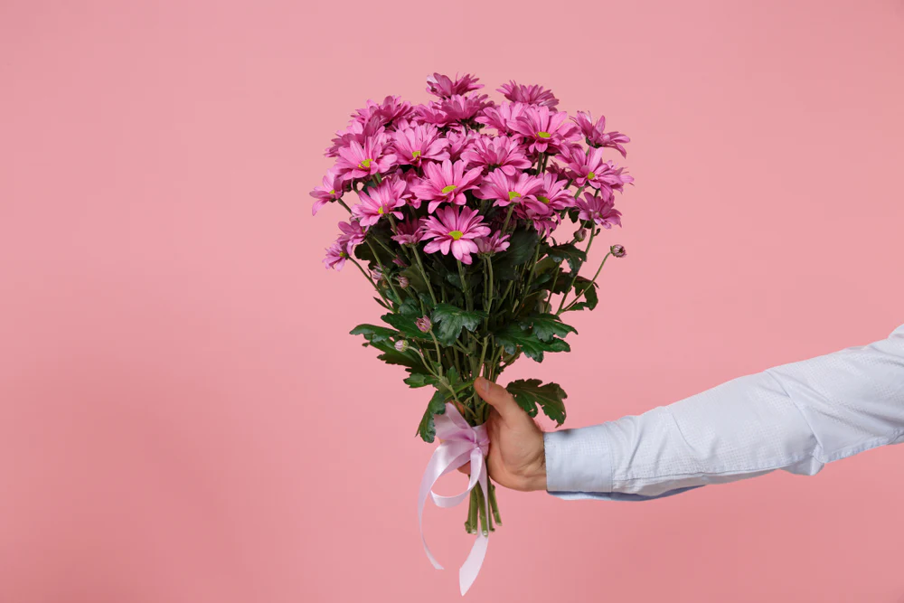 How to Remove Watermark from PicsArt Easily in 2025 3 Remove watermark from PicsArt image showing pink flowers bouquet on soft pink background