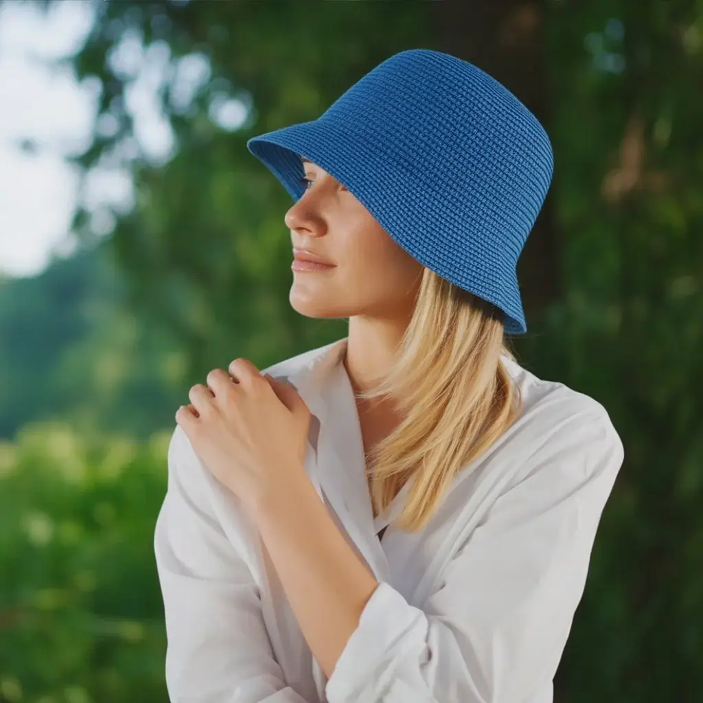 PicsArt Face Swap Guide 7 Woman in blue hat outdoors shown in The PicsArt Face Swap Guide to demo face filter and swap tool usage