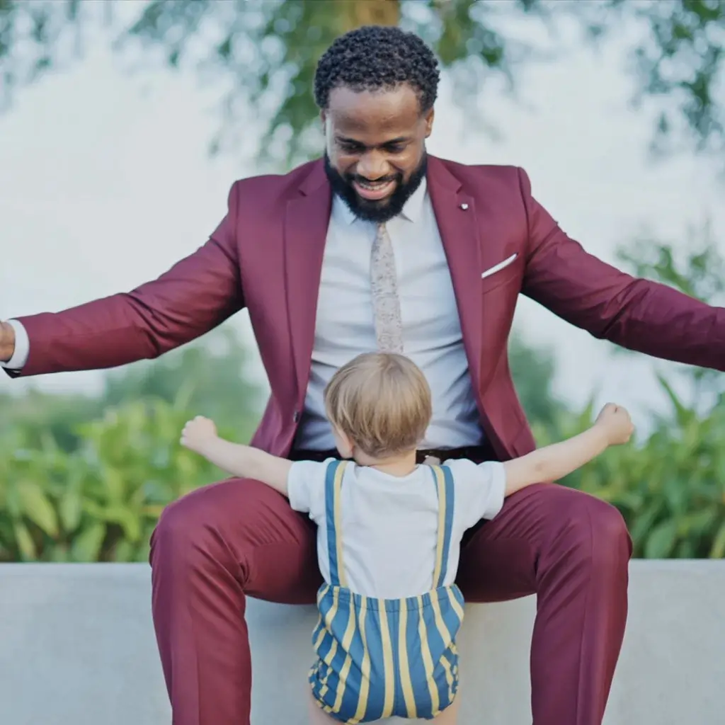 PicsArt Face Swap Guide 5 Father in maroon suit hugging child, example from The PicsArt Face Swap Guide showing family photo face swapping tricks.